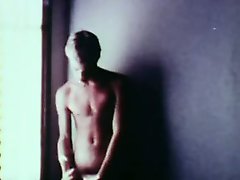 Vintage clip of a young blond man masturbarting until orgasm